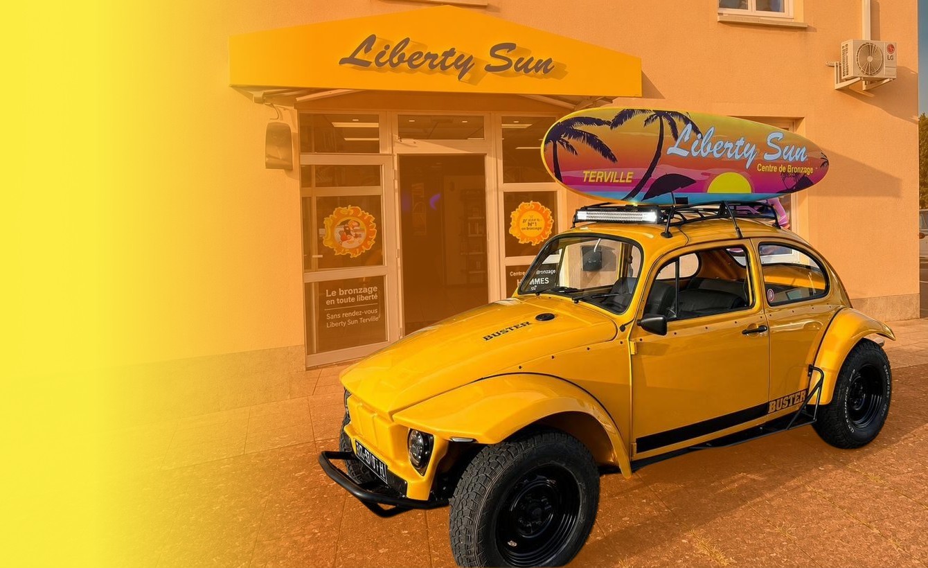 Devanture Liberty Sun à Terville avec sa coccinelle jaune